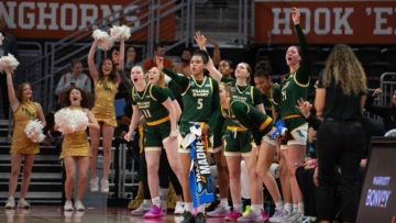 William & Mary players celebrate a bucket